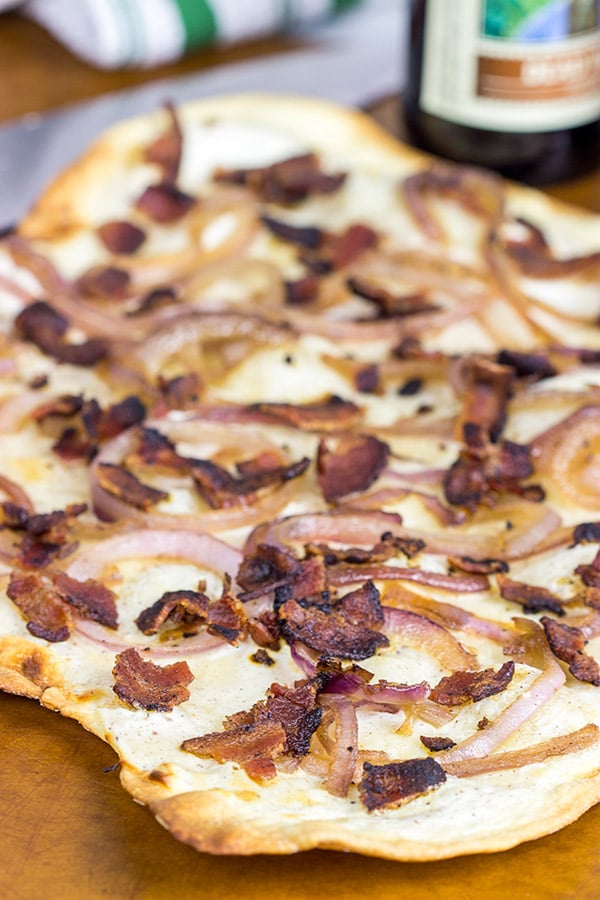 Flammkuchen, or tarte flambée in French, is a German-style thin-crust "pizza" topped with bacon and onions...and it's delicious!