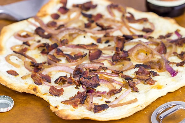 Flammkuchen, or tarte flambée in French, is a German-style thin-crust "pizza" topped with bacon and onions...and it's delicious!