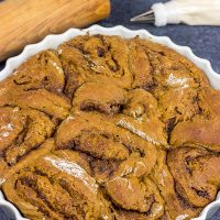 These Overnight Gingerbread Cinnamon Rolls are filled with comforting spices...and perfect for serving during the holidays!