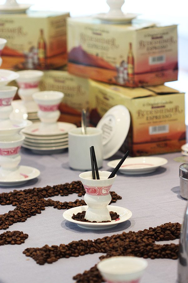 Rüdesheim Coffee is a unique German coffee cocktail featuring flambeed sweetened brandy topped with strong coffee, whipped cream and shaved chocolate.