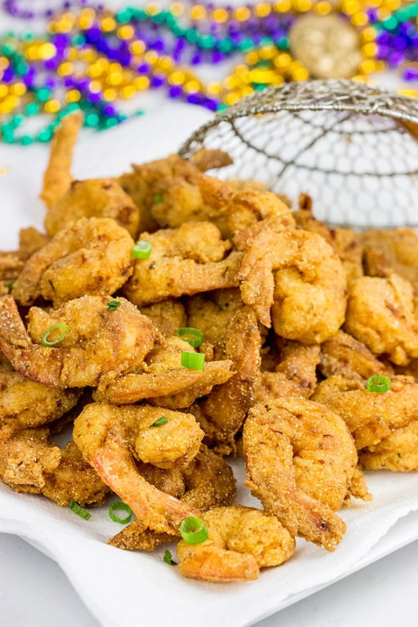Celebrate Mardi Gras in style this year with a batch of this Cajun Fried Shrimp + Spicy Dipping Sauce!
