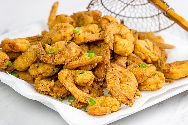 Celebrate Mardi Gras in style this year with a batch of this Cajun Fried Shrimp + Spicy Dipping Sauce!