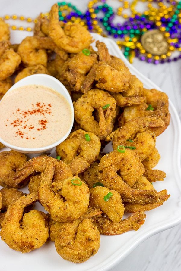 Celebrate Mardi Gras in style this year with a batch of this Cajun Fried Shrimp + Spicy Dipping Sauce!