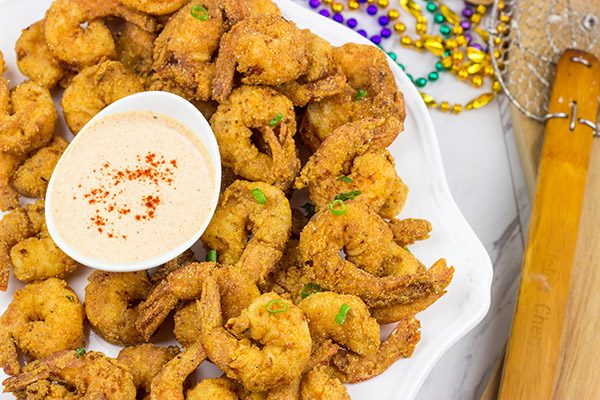 Celebrate Mardi Gras in style this year with a batch of this Cajun Fried Shrimp + Spicy Dipping Sauce!