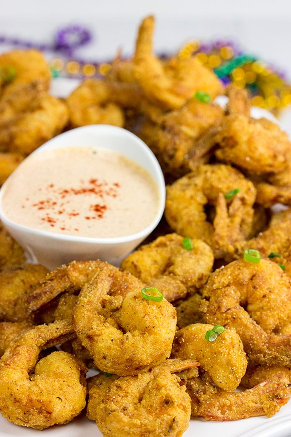 Celebrate Mardi Gras in style this year with a batch of this Cajun Fried Shrimp + Spicy Dipping Sauce!