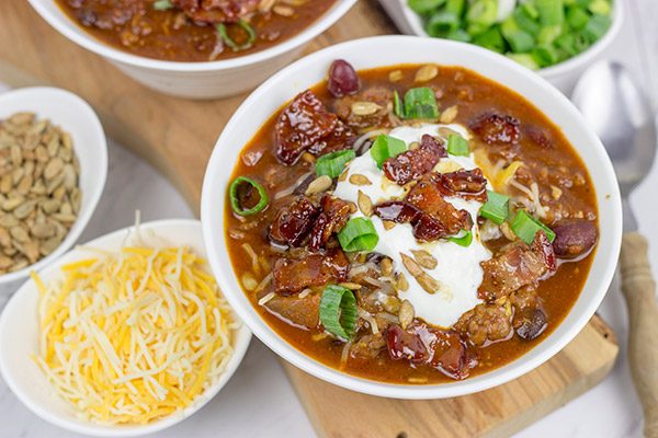 This Maple Bacon Chili is topped with maple candied bacon for an extra special layer of flavor! It's the perfect meal for a chilly (no-pun intended) Autumn evening!
