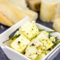 This Marinated Feta makes for a great holiday appetizer or light dinner!  Pop open a bottle of wine and share this one with friends!