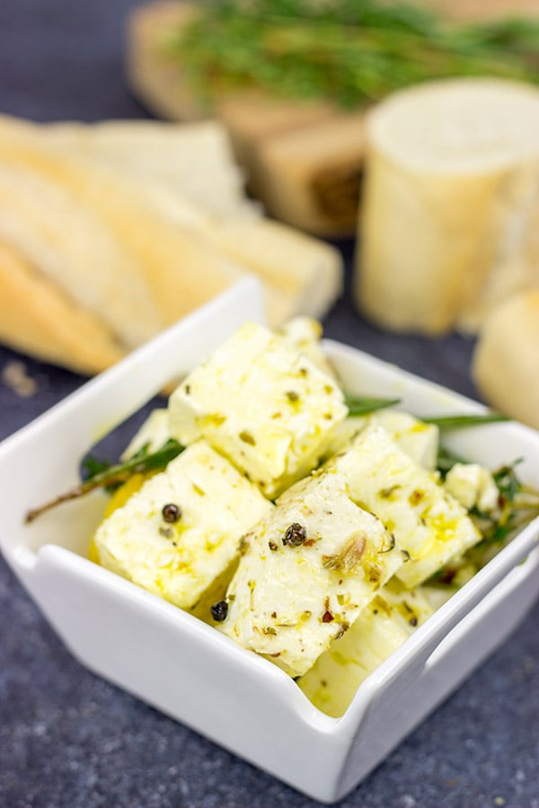 This Marinated Feta makes for a great holiday appetizer or light dinner!  Pop open a bottle of wine and share this one with friends!