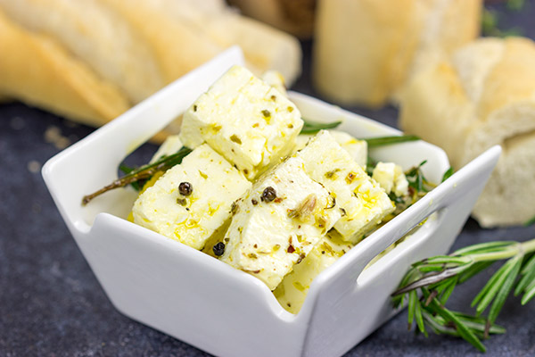 This Marinated Feta makes for a great holiday appetizer or light dinner!  Pop open a bottle of wine and share this one with friends!