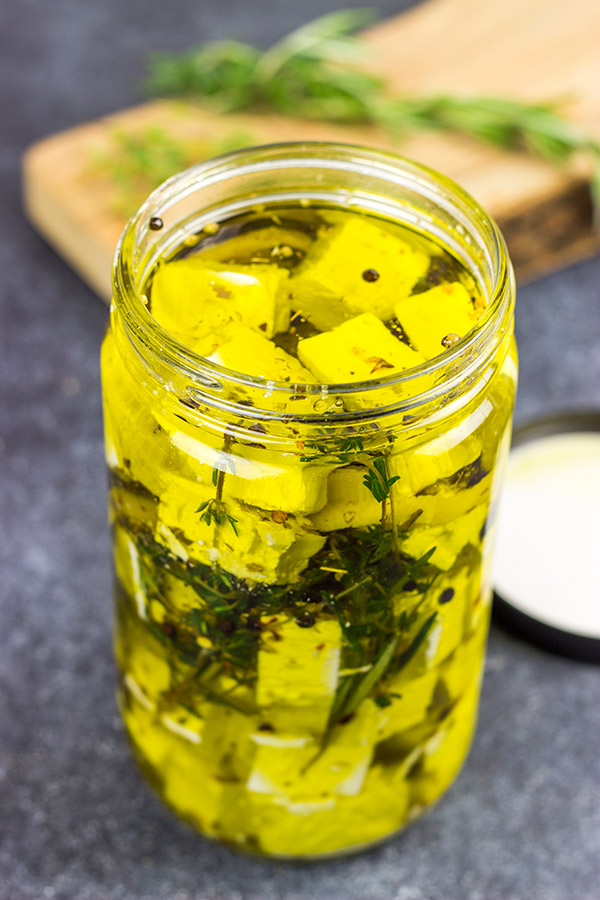 This Marinated Feta makes for a great holiday appetizer or light dinner!  Pop open a bottle of wine and share this one with friends!