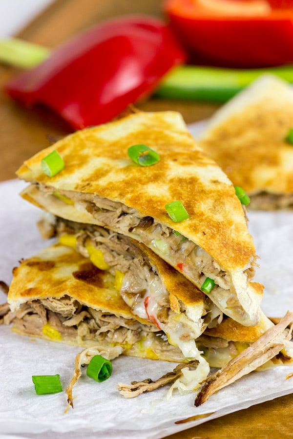 Melty cheese.  Shredded carnitas.  Buttery tortillas.  These Slow Cooker Carnitas Quesadillas make for one heck of a tasty meal!