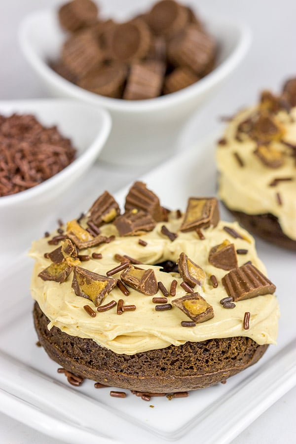Who said donuts are reserved for breakfast only?  These Baked Chocolate Peanut Butter Donuts make for a tasty dessert...or afternoon snack!