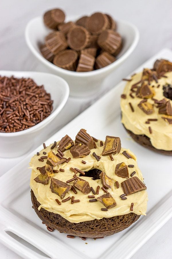 Who said donuts are reserved for breakfast only?  These Baked Chocolate Peanut Butter Donuts make for a tasty dessert...or afternoon snack!