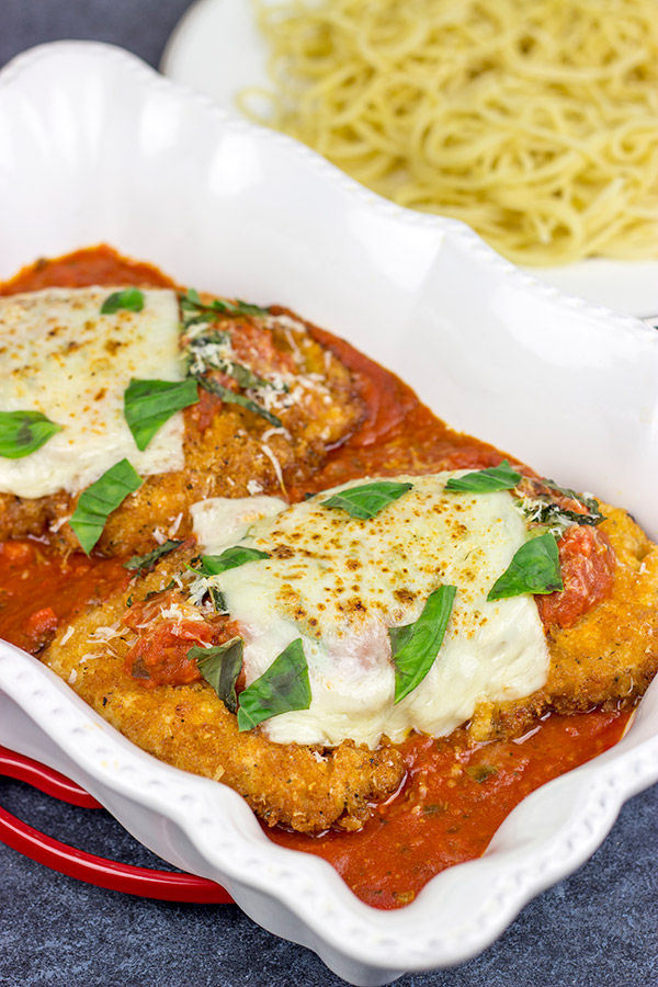 Chicken parm, you taste so good!  This Classic Chicken Parmesan recipe is the perfect comfort food for chilly winter days!