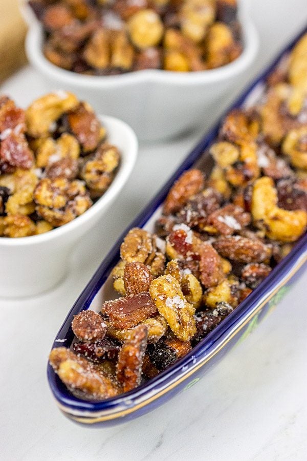 Looking for a fun and unique holiday appetizer? These Maple Glazed Nuts with Candied Bacon are salty, sweet and delicious!