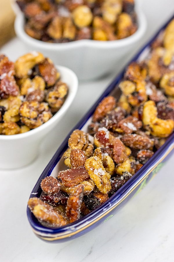 Looking for a fun and unique holiday appetizer? These Maple Glazed Nuts with Candied Bacon are salty, sweet and delicious!