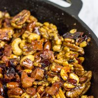 Looking for a fun and unique holiday appetizer? These Maple Glazed Nuts with Candied Bacon are salty, sweet and delicious!