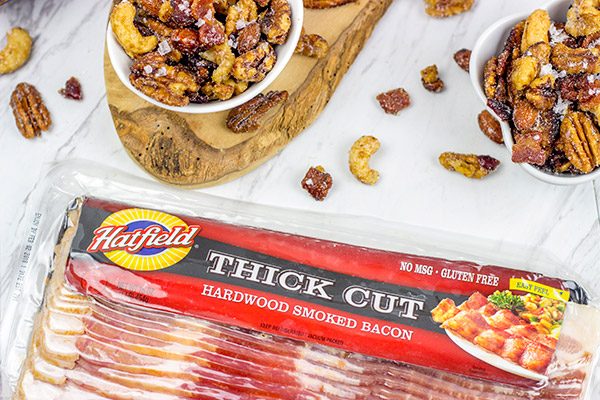 Looking for a fun and unique holiday appetizer? These Maple Glazed Mixed Nuts with Candied Bacon are salty, sweet and delicious!