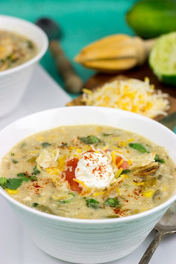 This Slow Cooker White Chicken Chili is perfect for cold winter days. A good squeeze or two of fresh lime juice adds a delicious boost of flavor to this recipe!