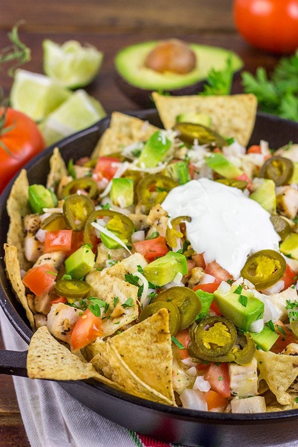 These Cast Iron Skillet Nachos are the perfect snack to serve while watching buzzer beaters in the NCAA Tourney!