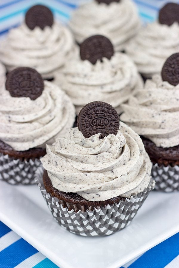 A moist chocolate cake and a cookies 'n' cream frosting combine to create these tasty Oreo Cupcakes!