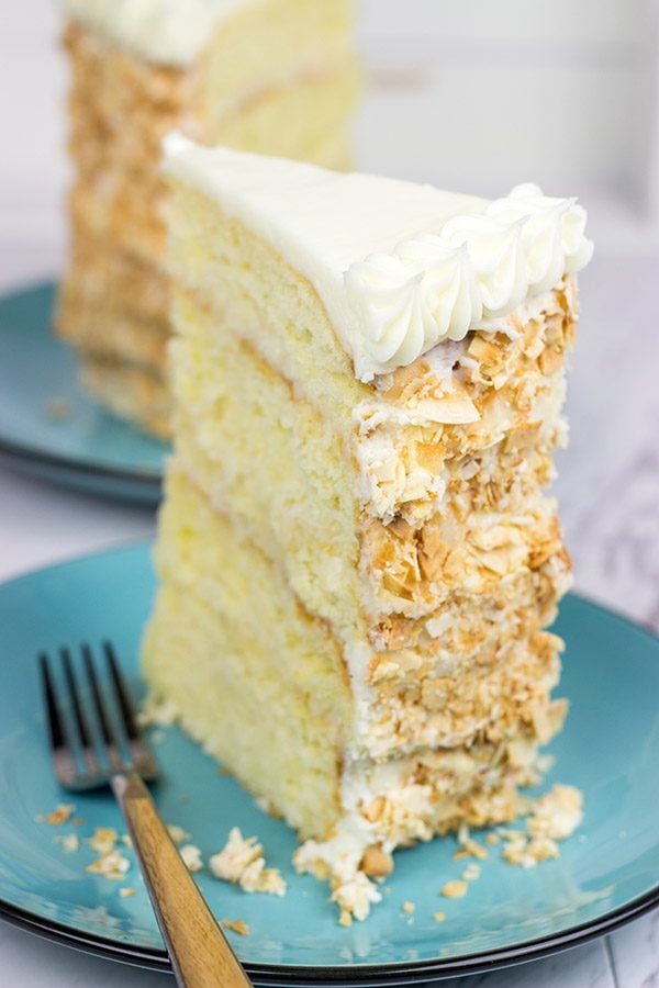 Warning: This Charleston Coconut Cake is a showstopper! This decadent dessert features layers of coconut cake filled with coconut cream...oh, and there's a coconut cream cheese frosting, too!