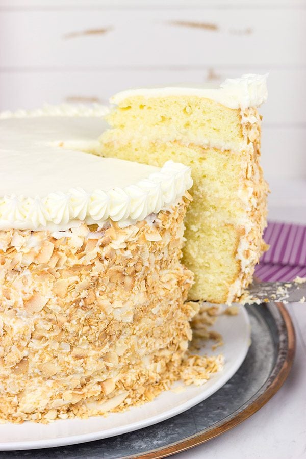 Warning: This Charleston Coconut Cake is a showstopper! This decadent dessert features layers of coconut cake filled with coconut cream...oh, and there's a coconut cream cheese frosting, too!