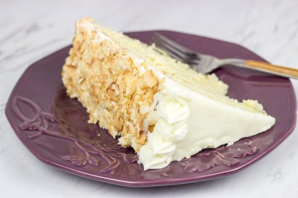Warning: This Charleston Coconut Cake is a showstopper! This decadent dessert features layers of coconut cake filled with coconut cream...oh, and there's a coconut cream cheese frosting, too!
