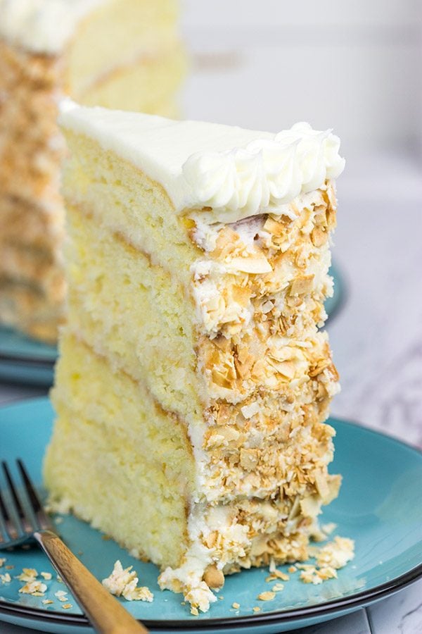 Warning: This Charleston Coconut Cake is a showstopper! This decadent dessert features layers of coconut cake filled with coconut cream...oh, and there's a coconut cream cheese frosting, too!