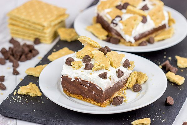 Celebrate warm summer days with this twist on a classic.  These Frozen S'mores Bars are sure to be a hit in your family!