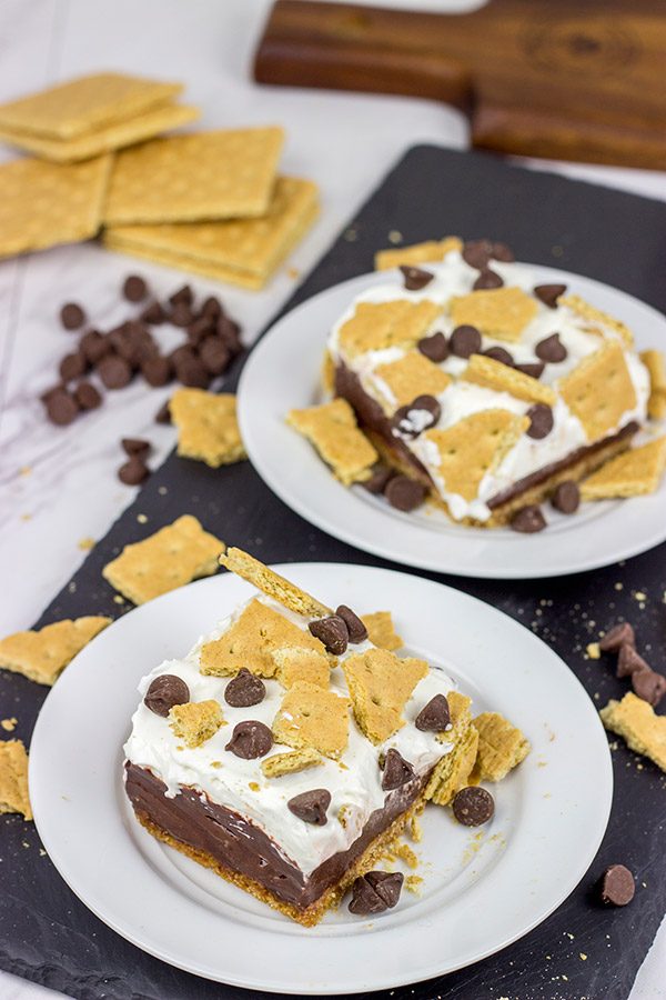 Celebrate warm summer days with this twist on a classic.  These Frozen S'mores Bars are sure to be a hit in your family!