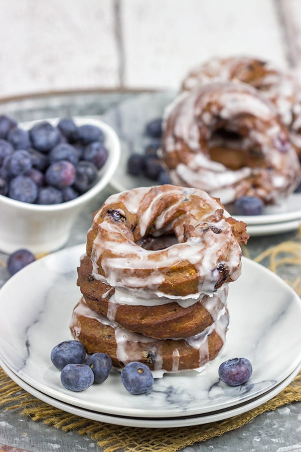 These Glazed Blueberry Crullers are a twisted cake donut filled with blueberries and drizzled with a classic glaze...and they're delicious!