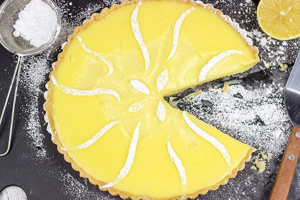 This Lemon Cream Tart is a packed with flavor, and it's the perfect dessert for a warm spring day!