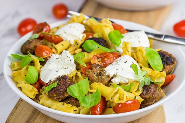 Time to mix up pasta night!  This Sausage and Basil Campanelle with Burrata is a delicious weeknight dinner idea!