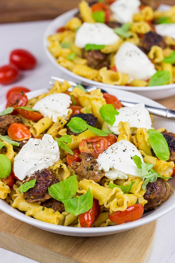 Time to mix up pasta night!  This Sausage and Basil Campanelle with Burrata is a delicious weeknight dinner idea!