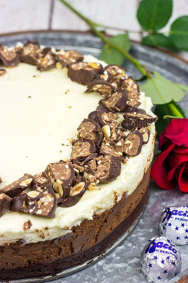 This Triple Chocolate Mousse Cake features 3 layers of chocolate, and it's topped with chopped Baci Perugina chocolate. This cake is perfect for any and all chocolate lovers in your life!