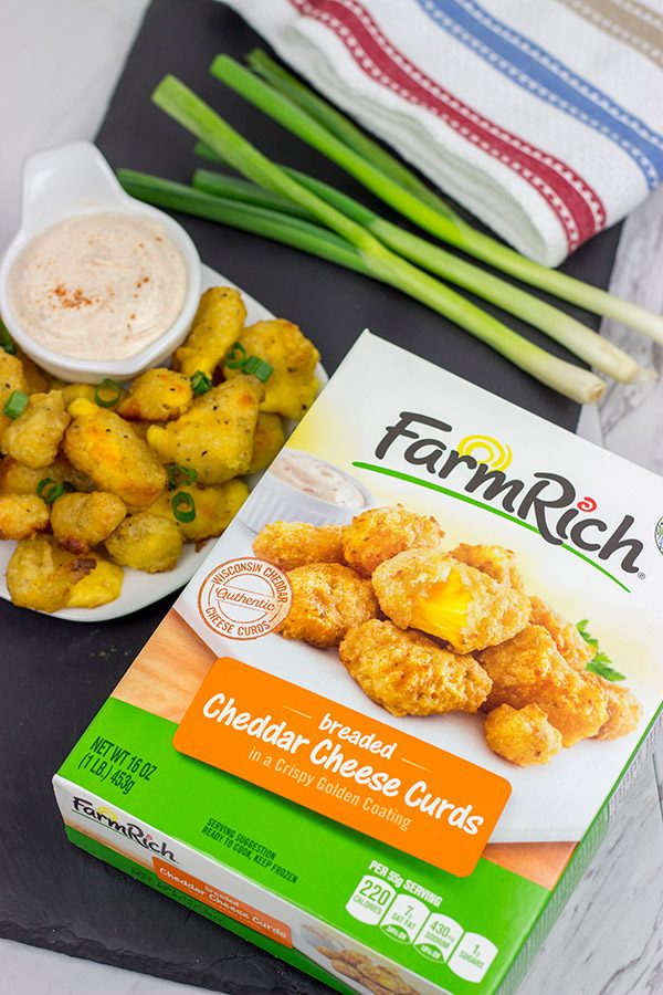 These Bacon and Cheddar Cheese Curd Bites make for a delicious appetizer...especially while watching sports!  And the smoky ranch dressing?  It's tasty enough to be a dip all by itself!