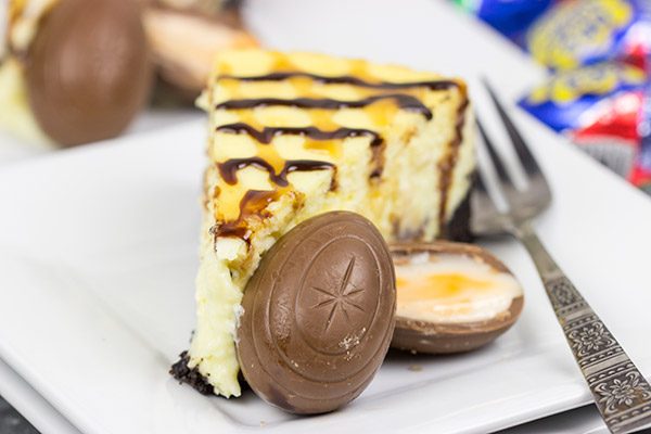 Get into the Easter spirit with a slice of this Cadbury Creme Egg Cheesecake!  It's a dessert that everybunny will enjoy!