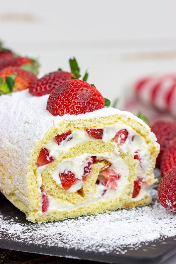 This Fresh Strawberry Cake Roll is a fun way to celebrate fresh summer strawberries! Grab a slice, sit back and enjoy!