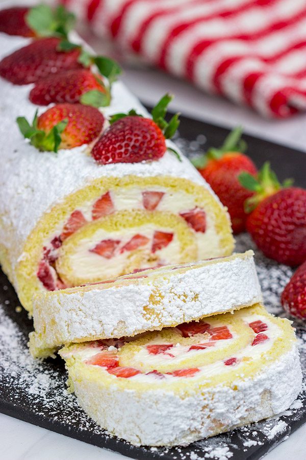 This Fresh Strawberry Cake Roll is a fun way to celebrate fresh summer strawberries! Grab a slice, sit back and enjoy!