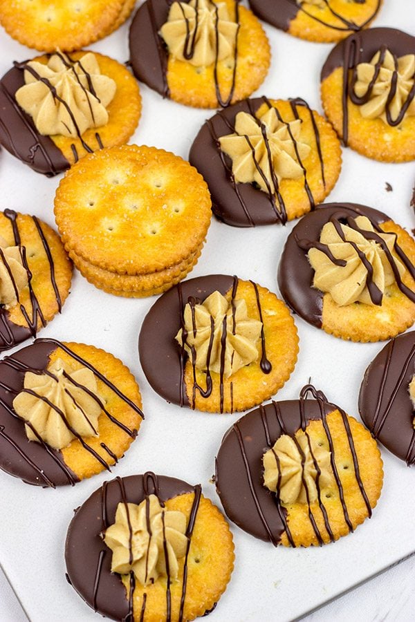 Looking for a fun entertaining idea? Grab a pack of RITZ and whip up these No Bake Chocolate Peanut Butter Pie RITZ Crackers!