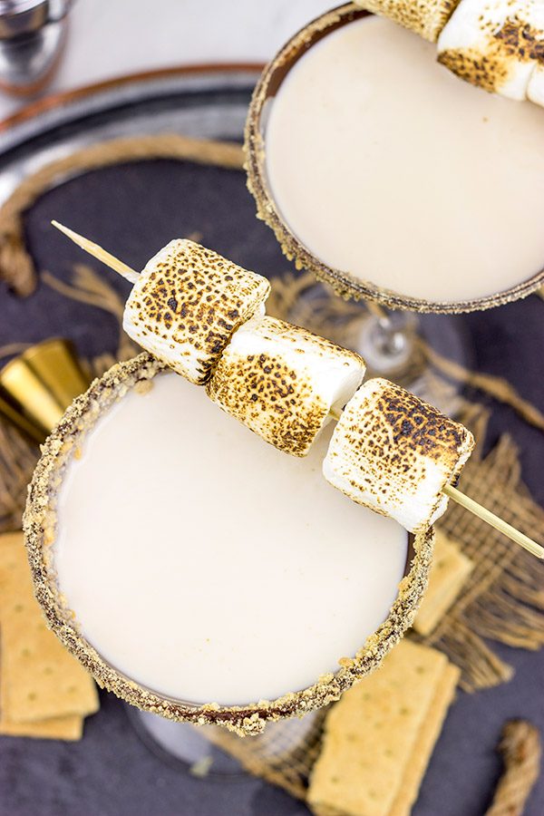Whether serving this Smores Martini next to a campfire or just on the back porch, it'll be the talk of the party! Cheers to fun summer drinks! Whether serving this Smores Martini next to a campfire or just on the back porch, it'll be the talk of the party! Cheers to fun summer drinks!
