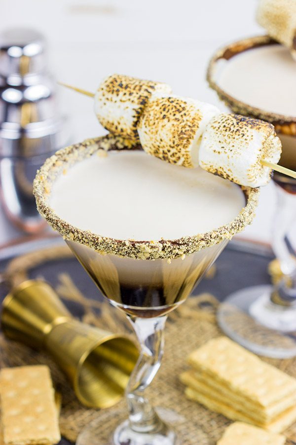 Whether serving this Smores Martini next to a campfire or just on the back porch, it'll be the talk of the party! Cheers to fun summer drinks! Whether serving this Smores Martini next to a campfire or just on the back porch, it'll be the talk of the party! Cheers to fun summer drinks!