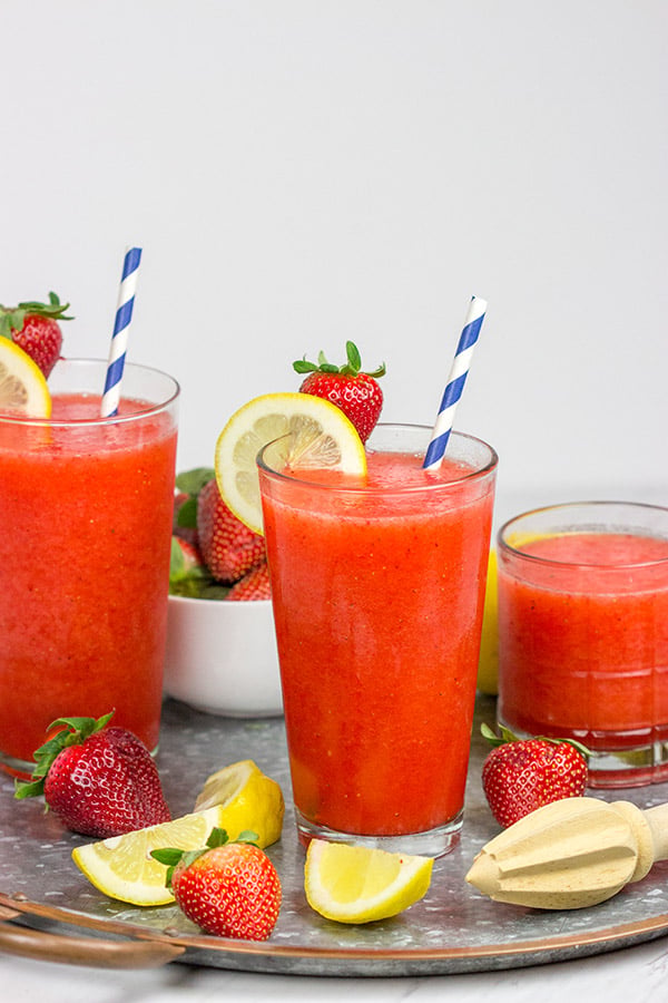 Made from just 3 ingredients, this Frozen Strawberry Lemonade is the perfect way to cool off when it's hotter'n blue blazes outside your door!