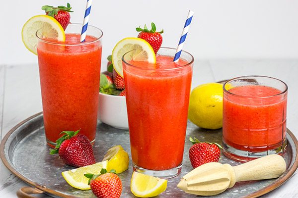 Made from just 3 ingredients, this Frozen Strawberry Lemonade is the perfect way to cool off when it's hotter'n blue blazes outside your door!