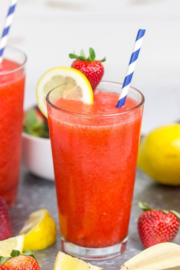 Made from just 3 ingredients, this Frozen Strawberry Lemonade is the perfect way to cool off when it's hotter'n blue blazes outside your door!