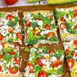 Got some extra veggies in the garden?  Whip up this easy Garden Vegetable Tart!  This tart is the perfect snack on a warm summer evening!