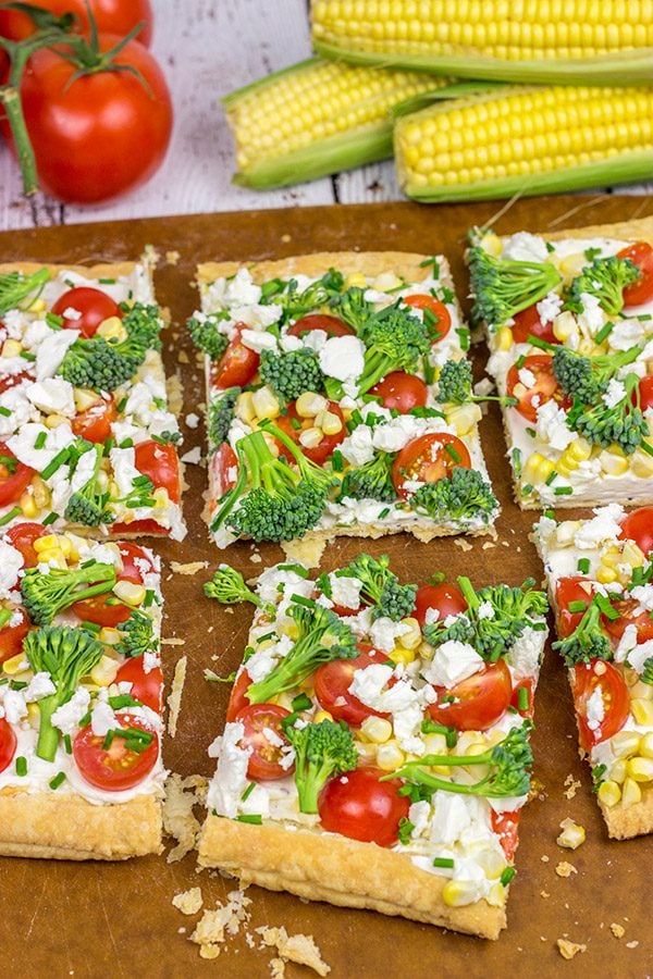Got some extra veggies in the garden?  Whip up this easy Garden Vegetable Tart!  This tart is the perfect snack on a warm summer evening!