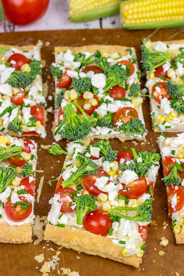 Got some extra veggies in the garden?  Whip up this easy Garden Vegetable Tart!  This tart is the perfect snack on a warm summer evening!