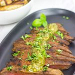 The flat iron steak is the 2nd most tender cut of beef behind only a tenderloin (aka "filet mignon").  Give the flat iron cut a shot with this Marinated Flat Iron Steak with Pesto Butter recipe!